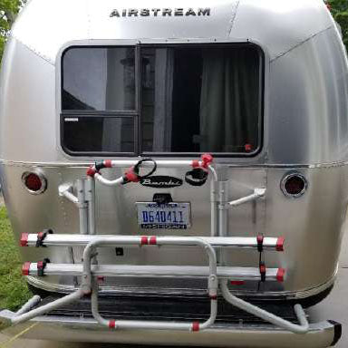 Airstream Carry-Bikes by Fiamma - 209397 Fiamma Bike Rack mounted on the back of an Airstream trailer.