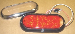 Airstream 6" Oval Red LED Taillight Kit - 512425 shown with bezel 512425-02